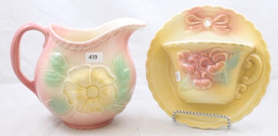 (2) Hull Sun Glow pcs.: 52-5.5" pitcher, pink; 80-6"d cup and saucer wall pocket, yellow