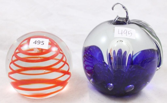 (2) Paperweights: 1-St. Clair cobalt apple; 1-Clear with red swirl design