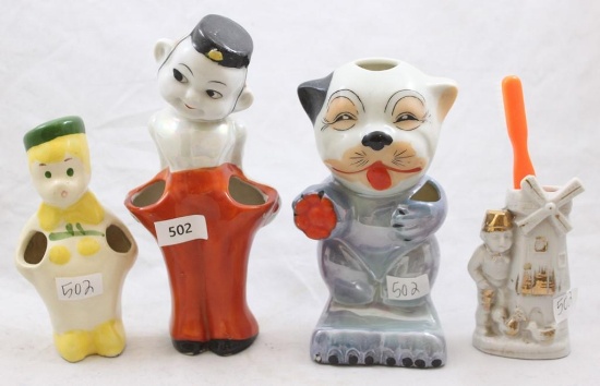 (4) Vintage novelty toothbrush holders incl. cat, bellhop, Dutch boy and Dutch boy/windmill