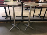 (2) 2' diameter upright tables, 45