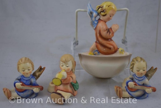 (4) Hummel figurines: (3) small candle holders and (1) water Font