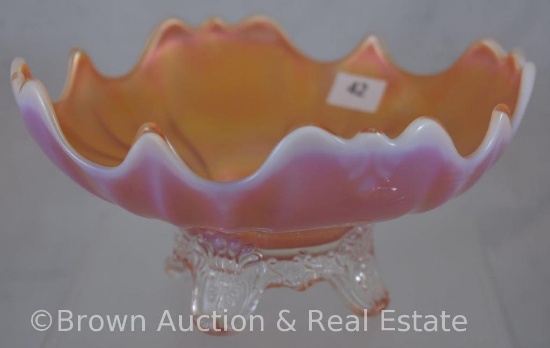 Carnival Glass 3"h x 6"d peach opalescent bowl with spatula feet