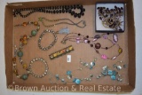 Box of assorted costume jewelry incl. necklaces and bracelets