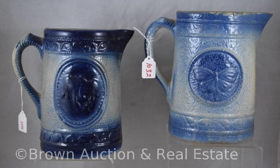 (2) Blue and white Stoneware pitchers: Butterflies, 8.5"h (hairlines); Cows, 8" (repaired top rim)