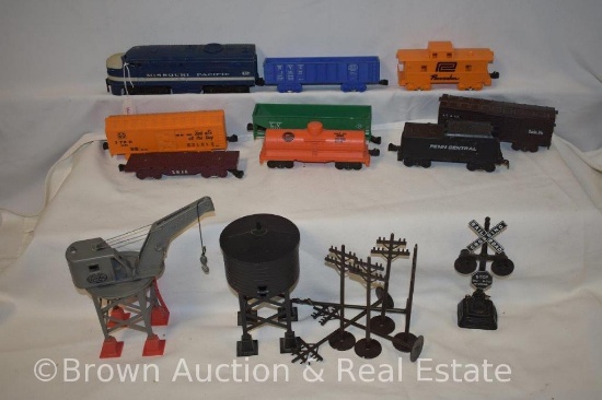 "O" guage train set, plastic, mostly Marx, includes track and scenery items but no transformer
