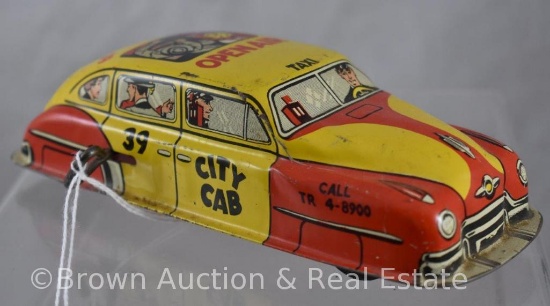 Yellow Skyview "Open Air City Cab 39" wind-up car, 7"l