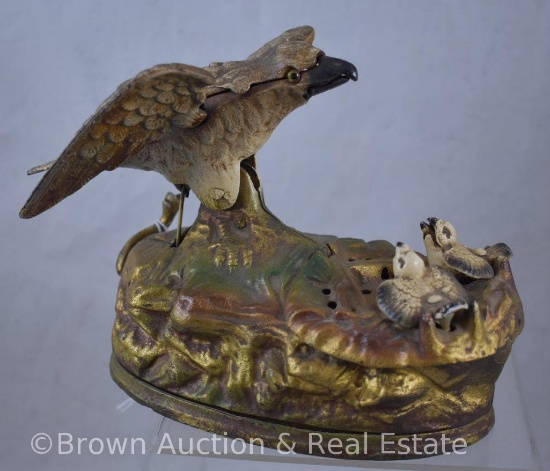 Cast Iron mechanical bank - Eagle feeding eaglets in nest