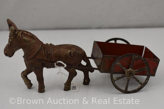 Cast Iron donkey and red pull cart