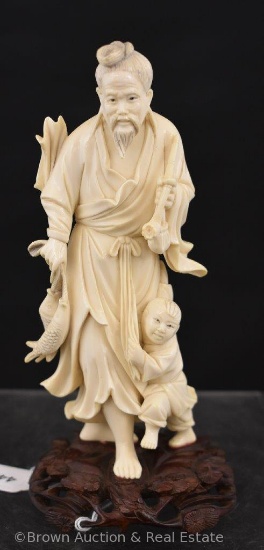 Oriental 7" hand carved figurine on wooden base
