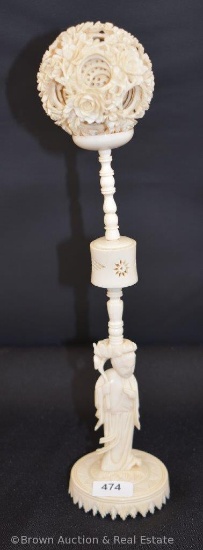 Oriental hand carved 9"h statue with puzzle ball
