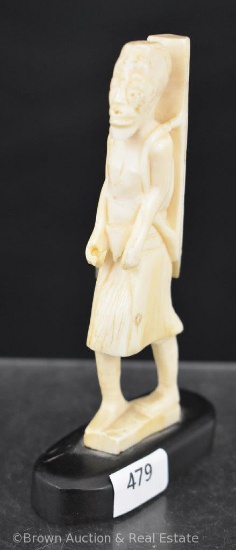 Oriental hand carved 5"h figurine, man with backpack and walking stick