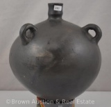 Ball-shaped Mexican black jug, 3-handled