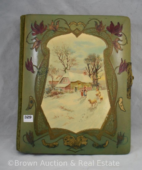 Vintage photo album with scenic celluloid cover