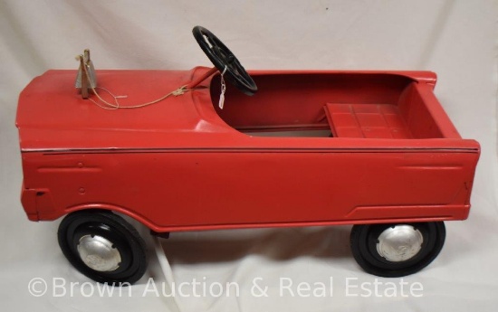 Vintage child's pink pedal car