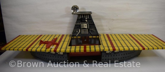 Tin litho aircraft carrier with elevator on wheels by Argo