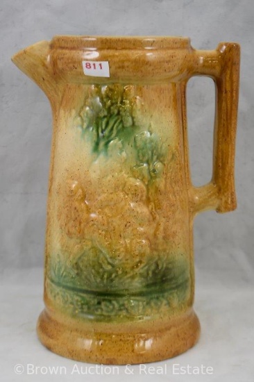 Stoneware 10.5"h tankard with embossed decoration