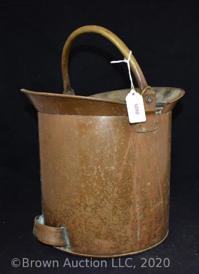 Old brass bucket with pour spout and handle
