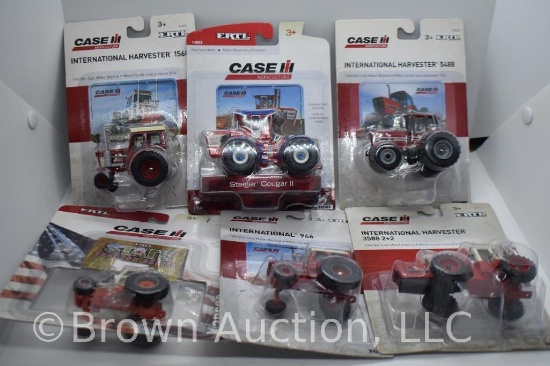 (6) die-cast International Tractors, all 1:64 scale