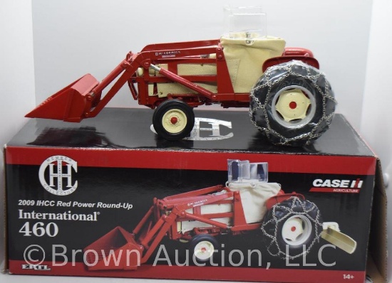 International 460 die-cast tractor with McCormick front-end loader, rear blade, tire chains and