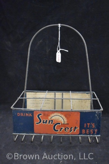 "Drink Sun Crest" metal bottle carrier