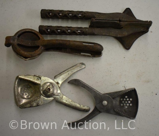 (4) Vintage lemon squeezers, metal and cast iron
