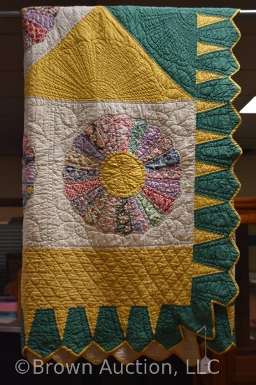 Multi-colored in yellow and green quilt