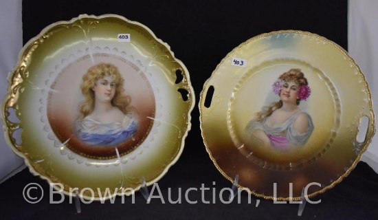 (2) Mrkd. Austria hand painted porcelain portrait cake plates, 10" and 11"d