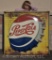 Pepsi-Cola embossed metal botte cap advertising sign, self-framed
