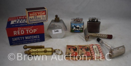 Assortment of old razors, razor blades, cigarette lighters and safety matches