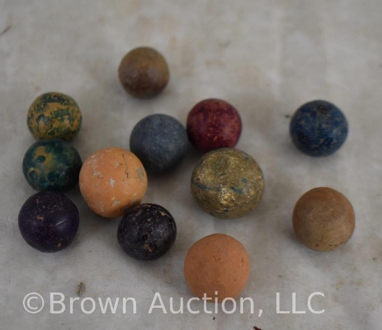 (12) Clay marbles