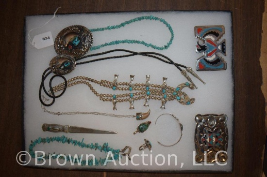 Assortment of Native Indian jewelry inc. turquoise necklaces, bracelet, bolo tie, belt buckles, etc.