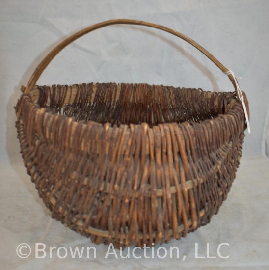 Vintage curved wicker basket
