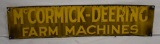 McCormick-Deering Farm Machines single sided tin embossed sign