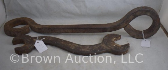 (2) Large Cast Iron tools - wrench and ???