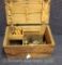 Old wooden box with early reloading equipment and paper shotgun shells