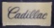 Cadillac ribbed plastic sign (little roiugh)