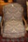 Ornate upholstered side chair w/decorative wood frame, roses crest and apron