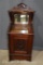 Victorian chiffonier-style coal scuttle, beveled mirror back, ornate crest piece, Ca. 1890