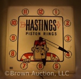 Hastings Piston Rings light-up advertising clock