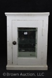 Vintage medical examination room wood cabinet, glass shelves