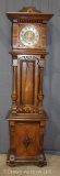 Large ornate German open well Grandfather clock (bottom section has vertical crack in wood), Ca.
