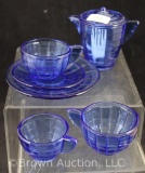 Akro Agate transparent cobalt child's tea pot, plate, (3) cups and (1) saucer