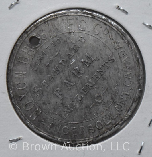 Noxon Bros. Mfg. farm implements token