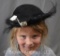 Black velvet hat by Louie Miller w/feather details