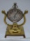 Elgin pocket watch mounted on gold holder, 4