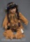 Porcelain Native American Indian girl doll, 15