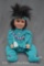 Porcelain Native American Indian happy girl doll, 21
