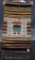 Native American Indian rug, colorful stripes w/figure center, 20
