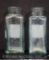 (2) Doc T Marshall's embossed snuff bottles