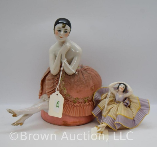 (2) Art Deco porcelain half doll pin cushions, sitting